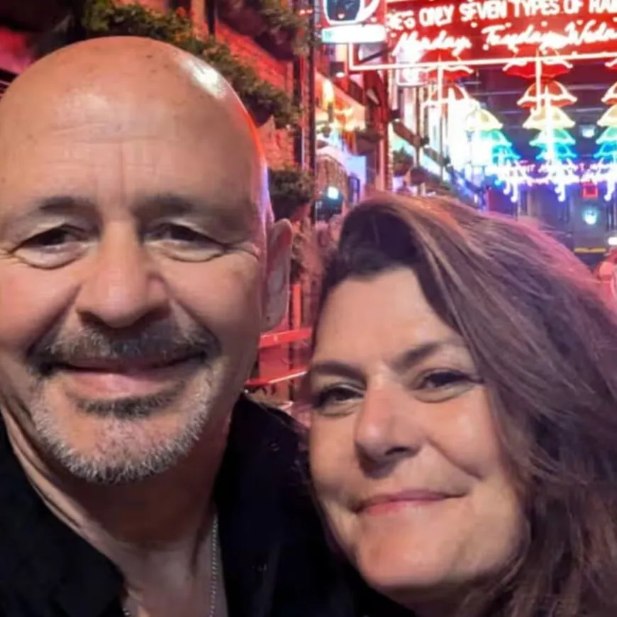 The smiling couple who got engaged in Belfast.