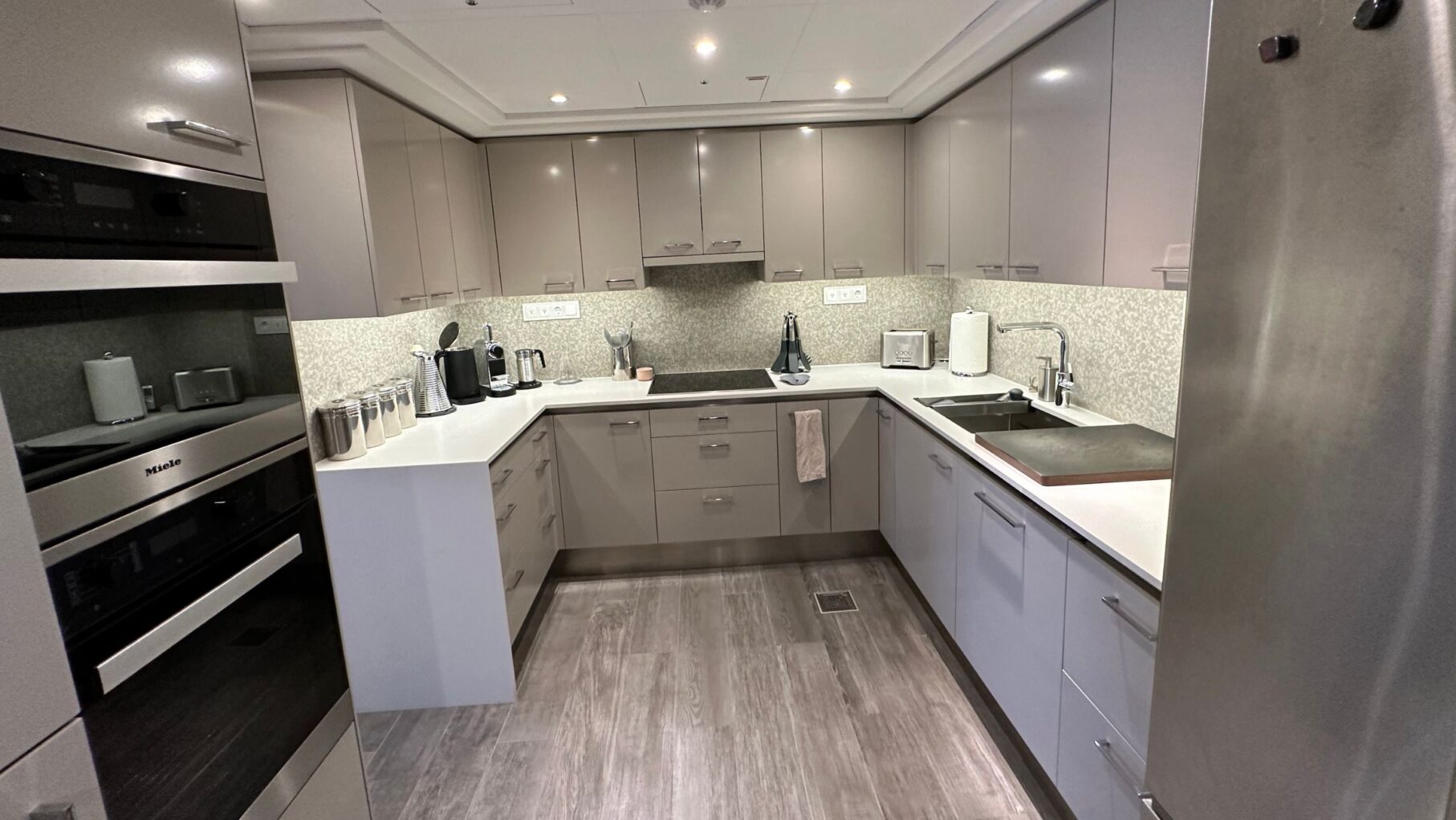 A kitchen in one of the two-bedroom apartments on The World