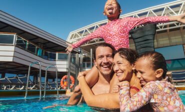 A family onboard in the pool the new Carnival Cruise Line's 2026/27 itineraries