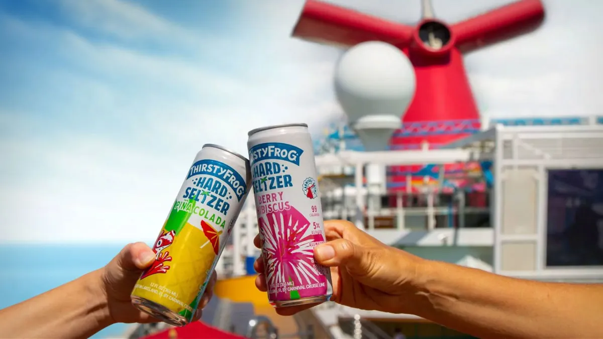 Two people drinking onboard a Carnival Ship