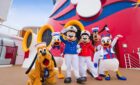 Disney Mascots hugging on a cruise ship.