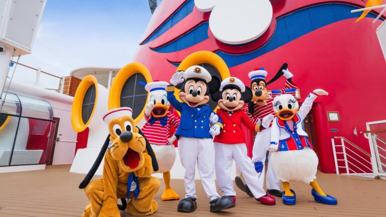 Disney Mascots hugging on a cruise ship.