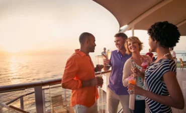 people on a cruise consuming beverages happily