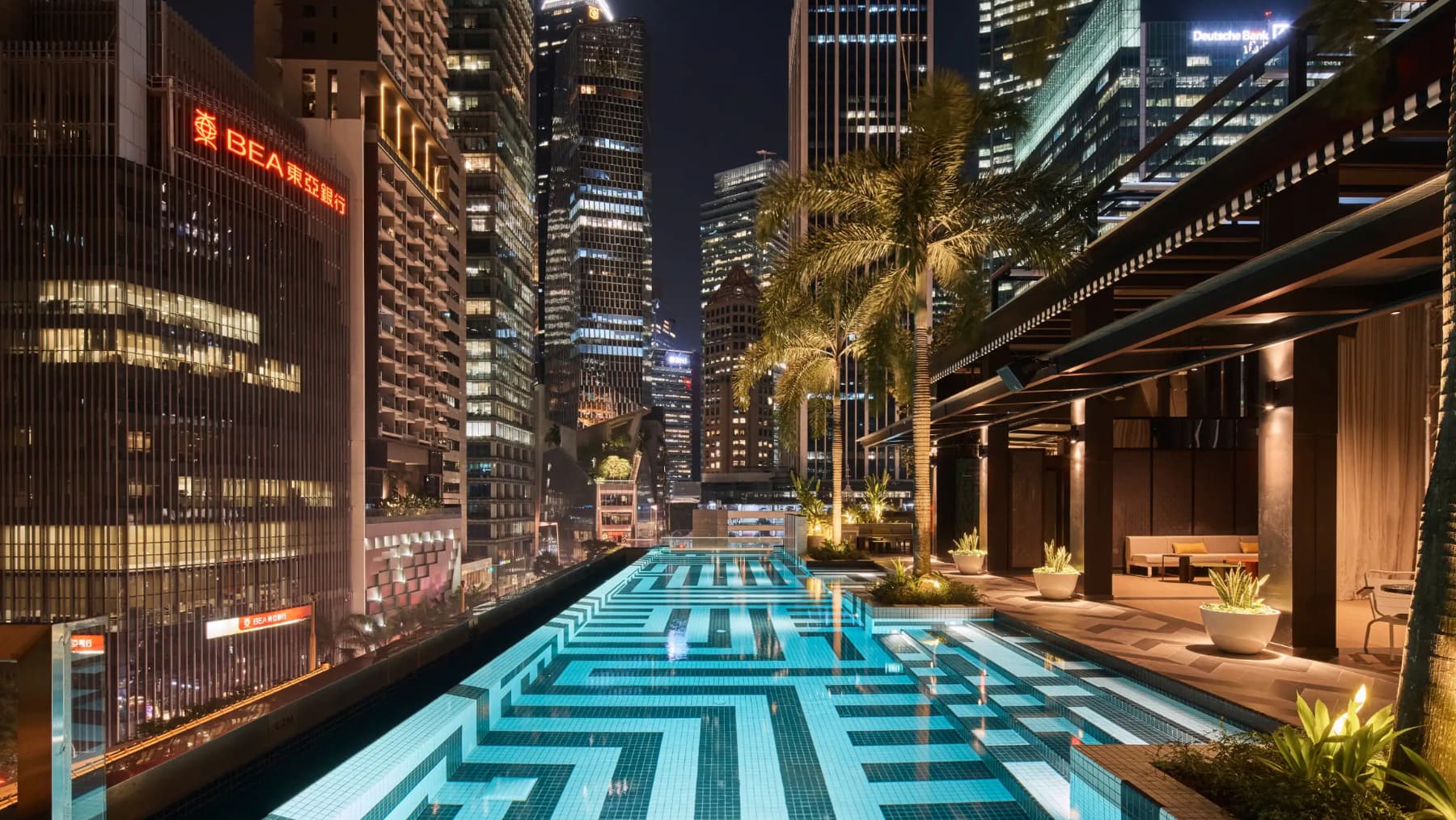 The rooftop pool at QT Singapore