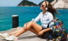 A woman in the South Pacific with her headphones