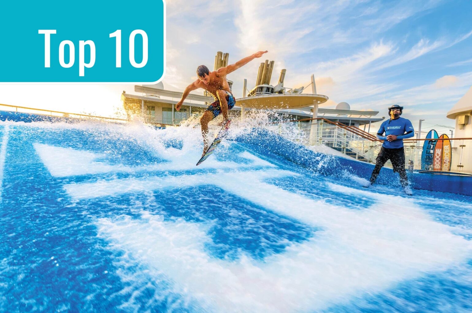 A person surfs on a flow rider while another stands nearby, possibly instructing. The background shows a cruise ship deck under a blue sky. Text reads "Top 10."