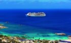 A Norwegian Cruise Line ship sailing the water in the Caribbean