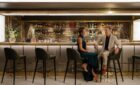 A couple at the Meridian Lounge on Regent Seven Seas