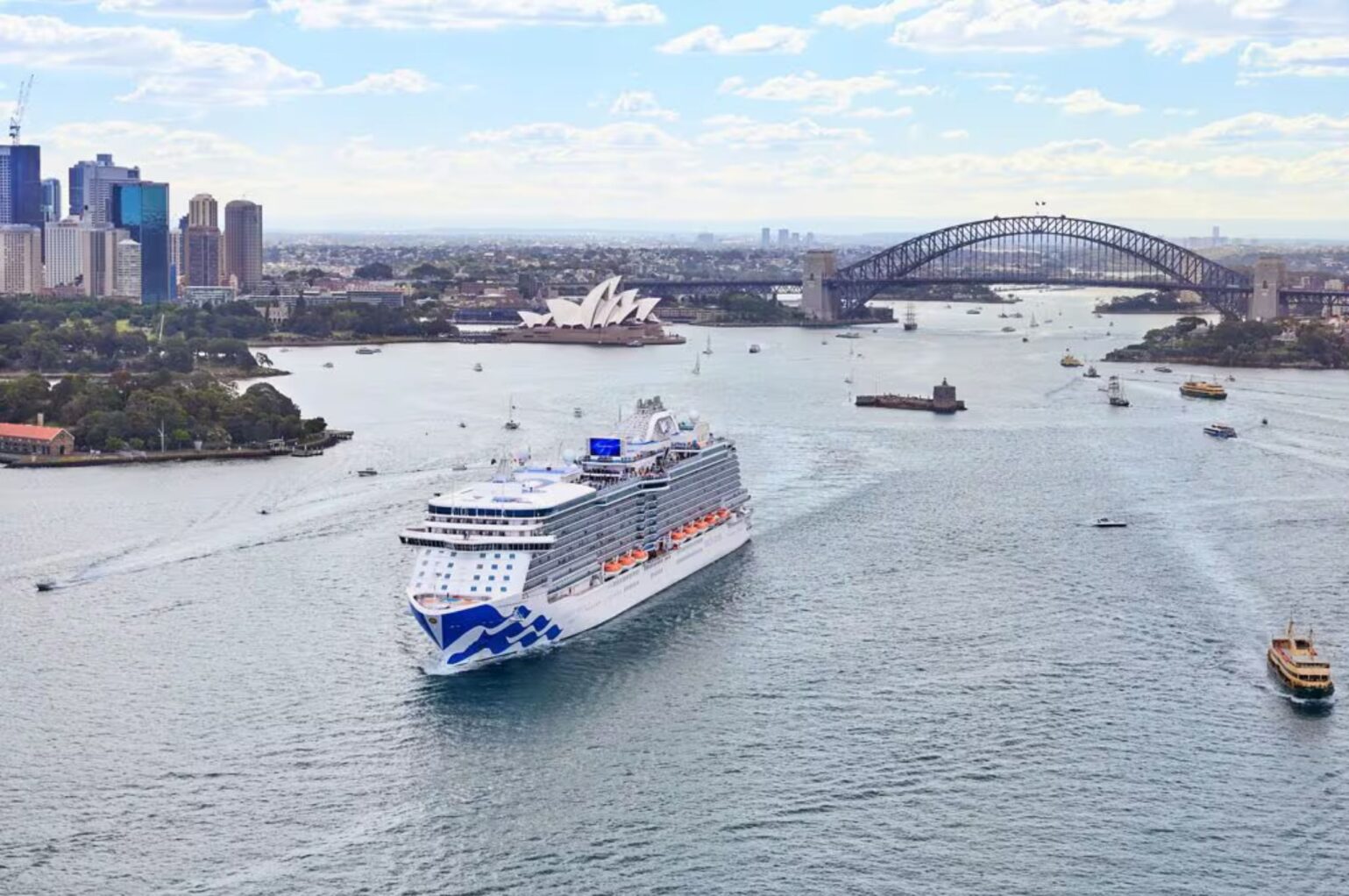 Crown Princess cruise ship departing Sydney harbour, away from the harbour bridge