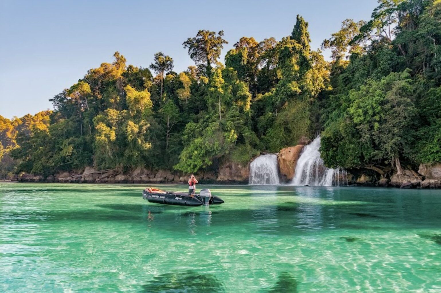 A shore excursion in bright clear waters in West Papua, Indonesia, with Ponant
