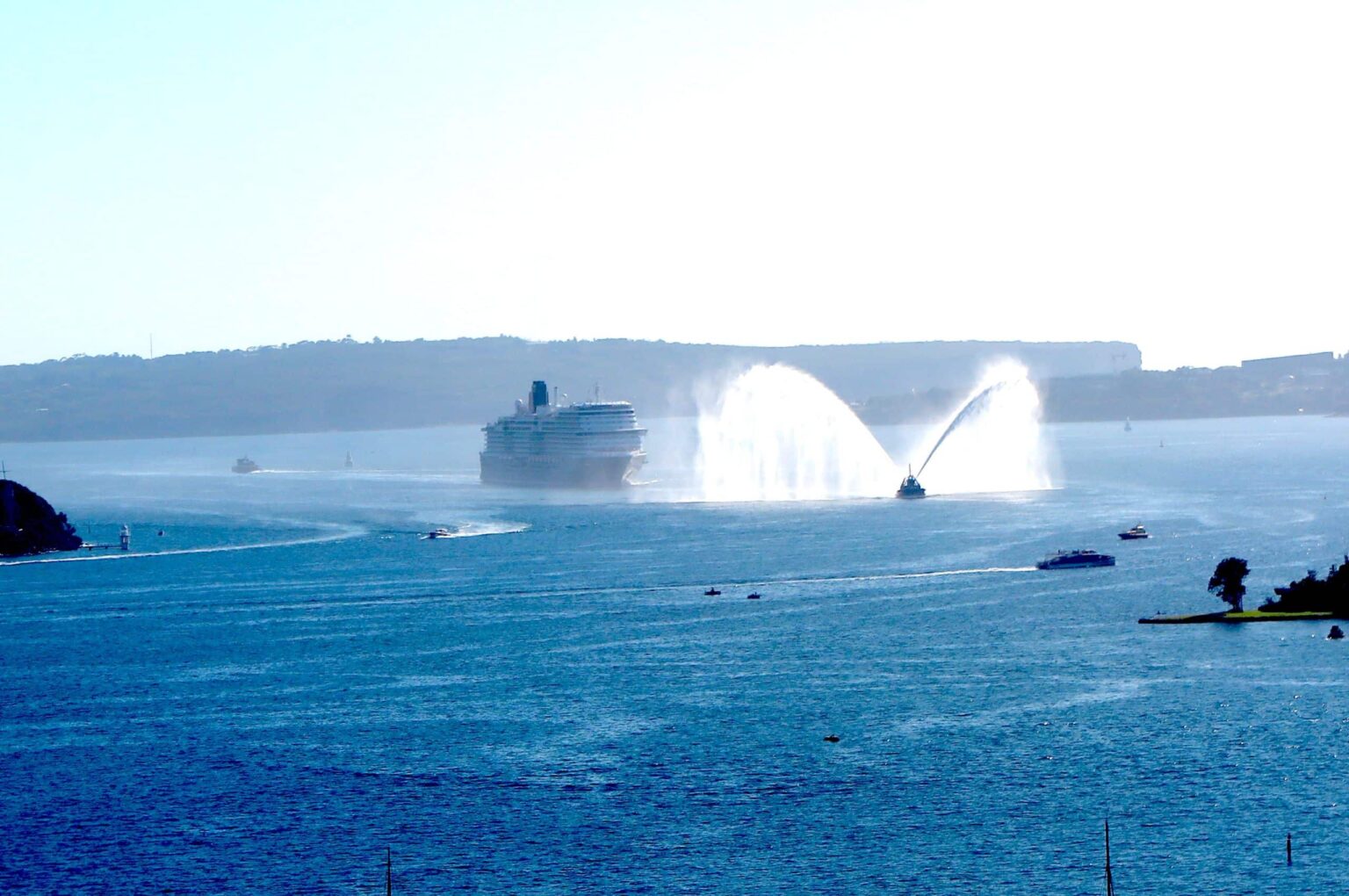 Queen Anne follows a water salute into Sydney harbour