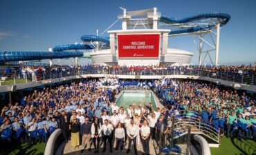 Carnival Adventure and crew with Christine Duffy