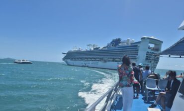 Passengers travelling on Pacific Encounter heading back to the ship in Airlie Beach