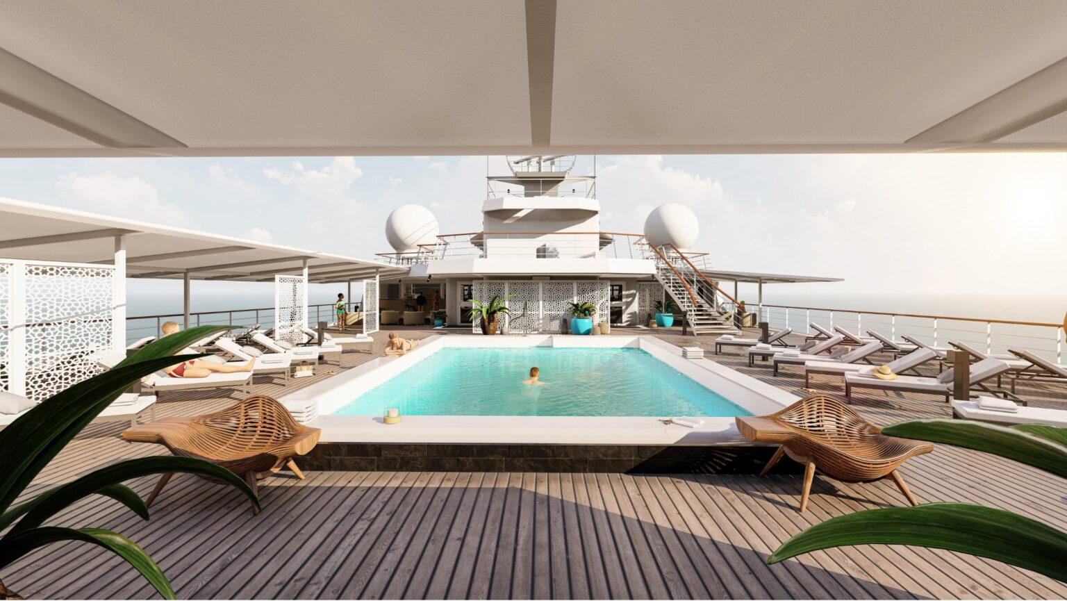 The pool deck on refurbished Paul Gauguin with its new white chaise loungers