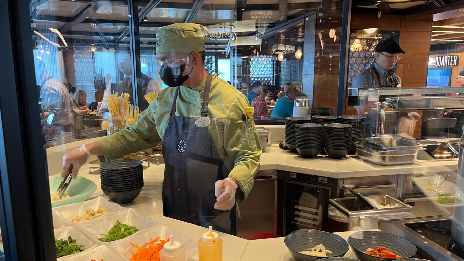 The Nudls chef cooking Asian-inspired meals