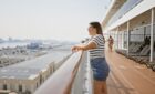 a woman wears jeans on a cruise ship