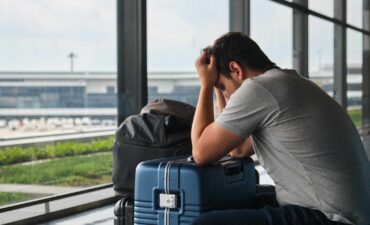 sad man in airport