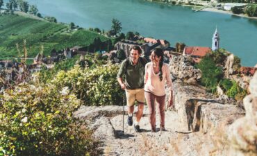 A couple hiking along the Danube River