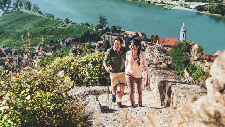 A couple hiking along the Danube River
