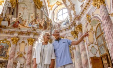 A couple in Europe on a Uniworld river cruise