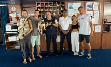 Carnival Splendor rescues four people and three dogs