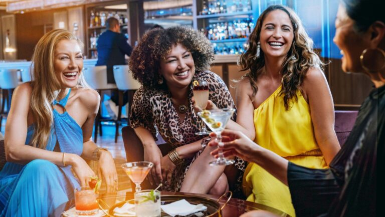 A group of women drinking onboard a Princess ship with cocktails