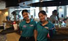 happy crew aboard the Carnival Encounter