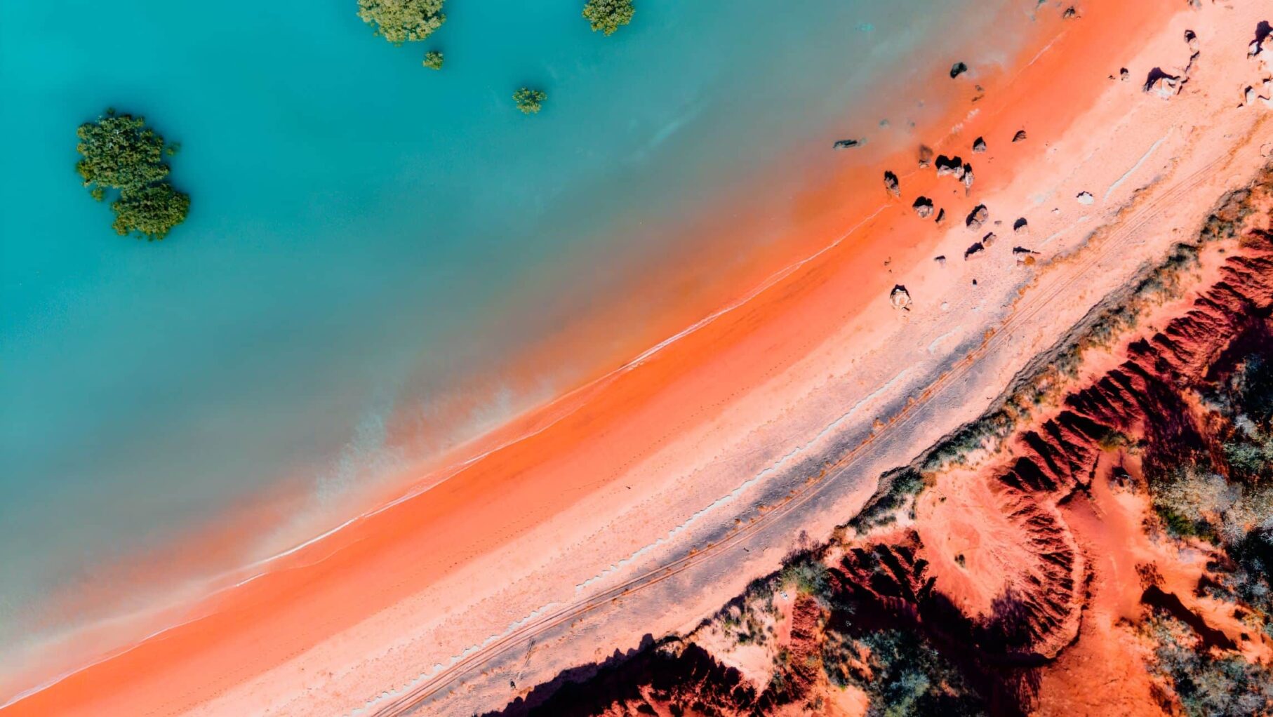 see the stunning red rock of the Kimberley. (Image via Shutterstock).