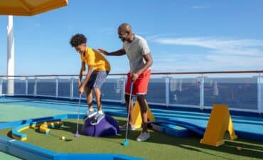 dad and kid on cruise ship