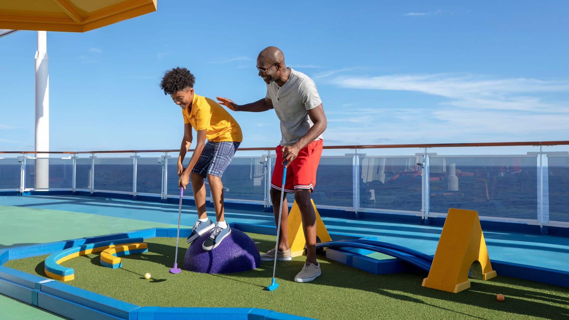 dad and kid on cruise ship