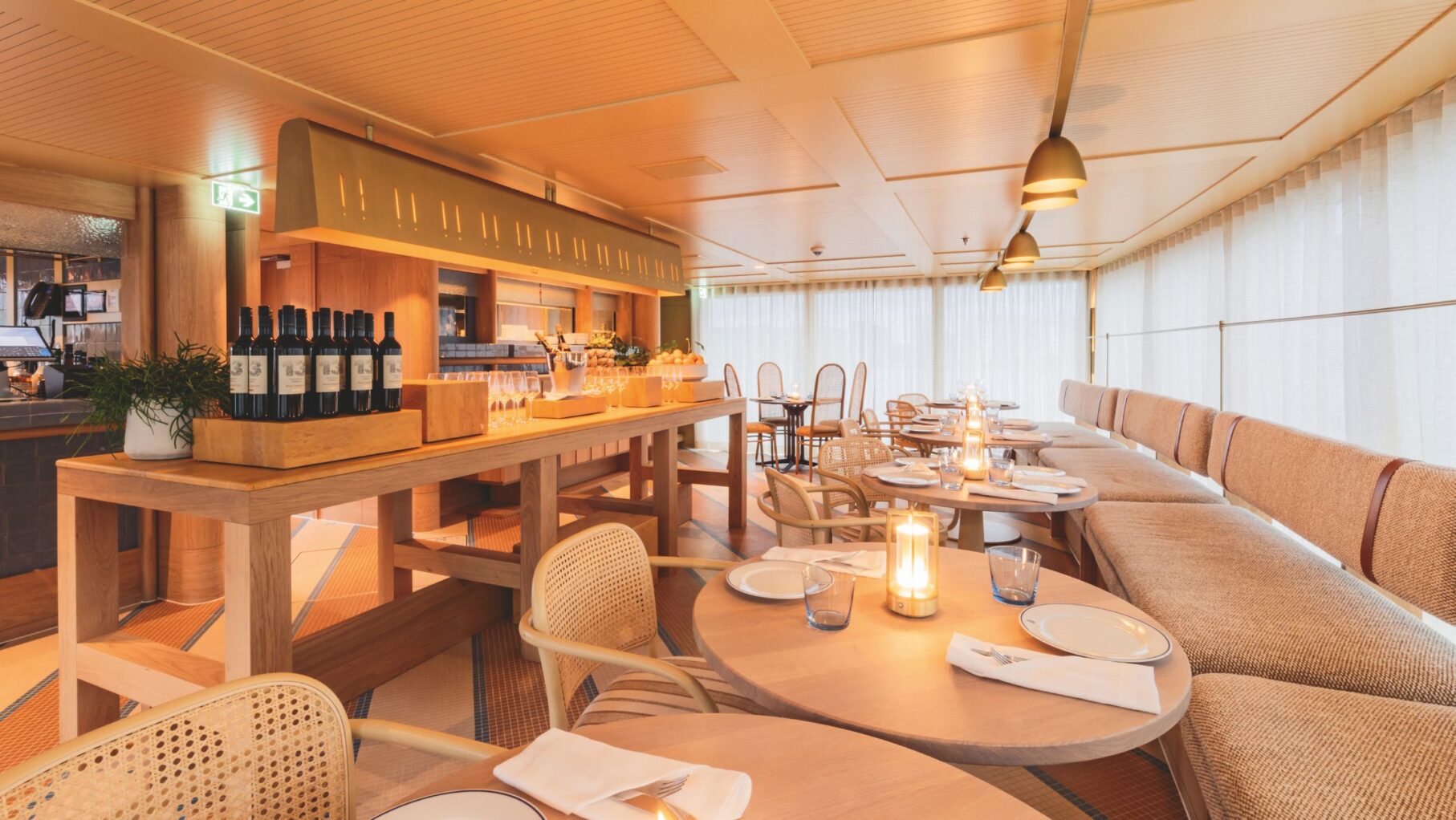 The warm interiors of the Gruner Bar and Dining
