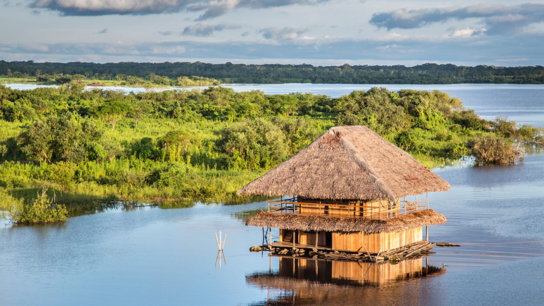 Traditional house on the Amazon river in Iquitos, Loreto, Peru