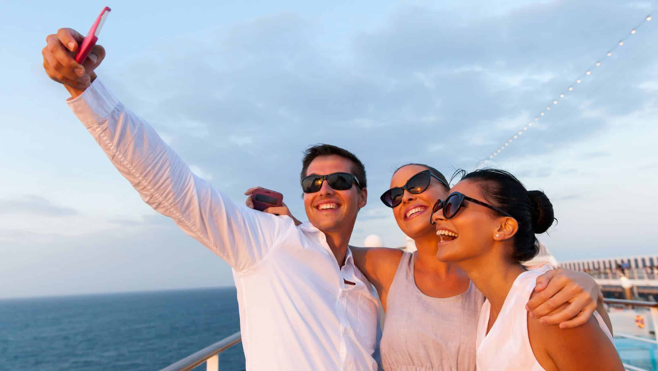 People take selfie on cruise ship