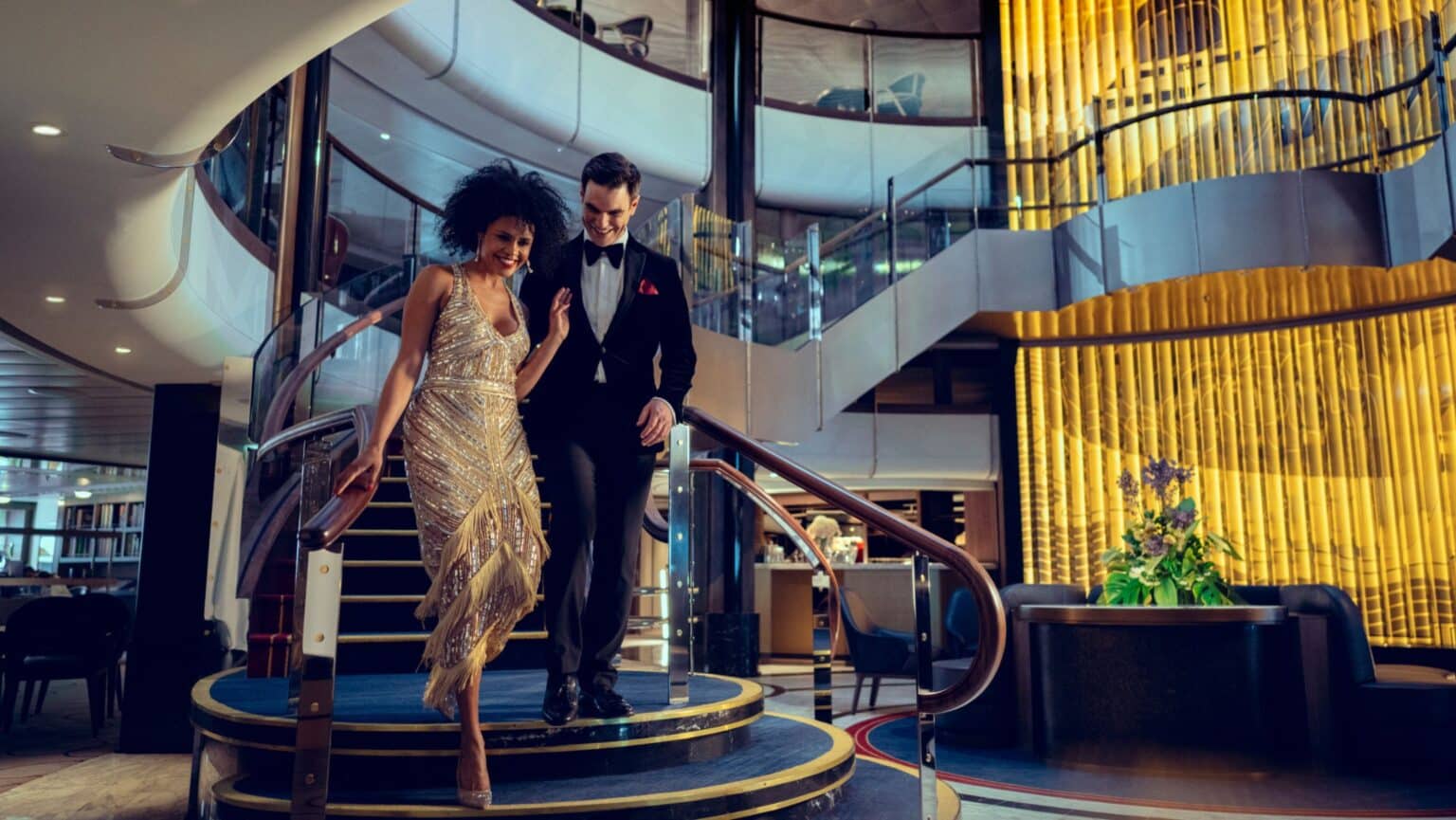 Cunard entertainment woman walking down the stairs