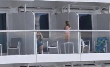 child on cruise ship balcony