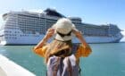 Woman looking at cruise ship