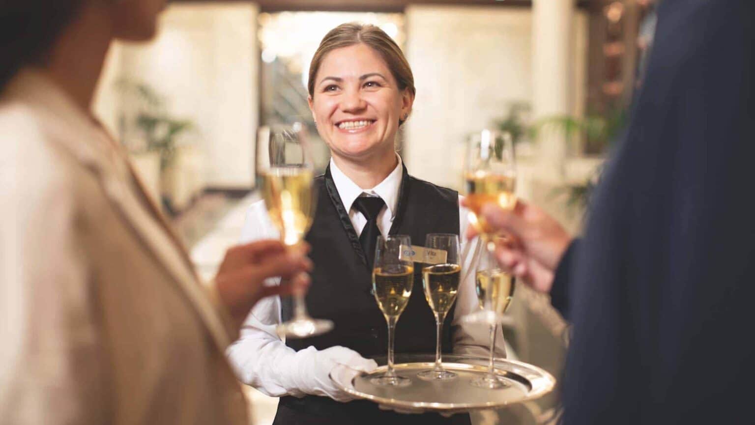 Guests are welcome aboard Regent Sevens Seas with a glass of champagne.