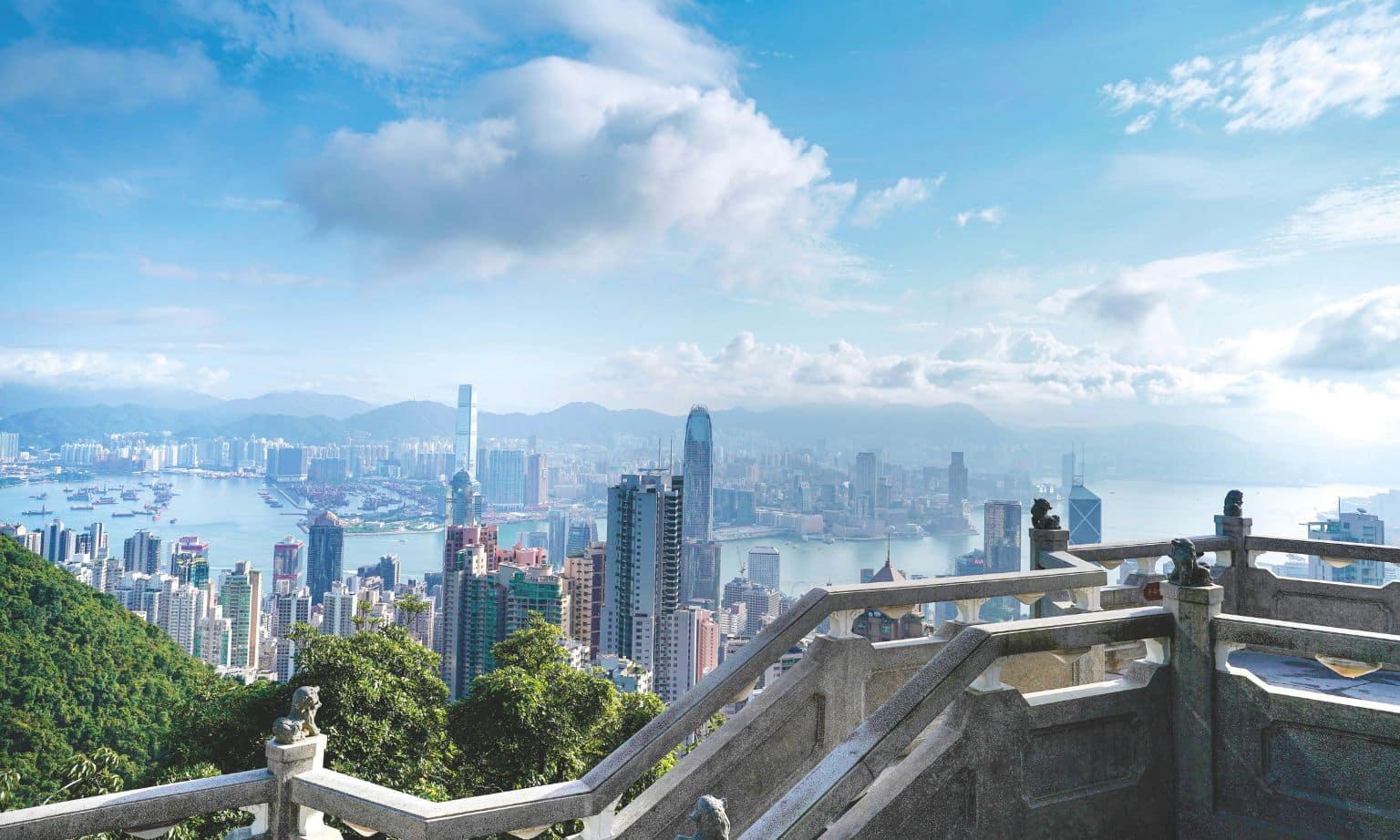 Take a tram to Victoria Peak in Hong Kong.