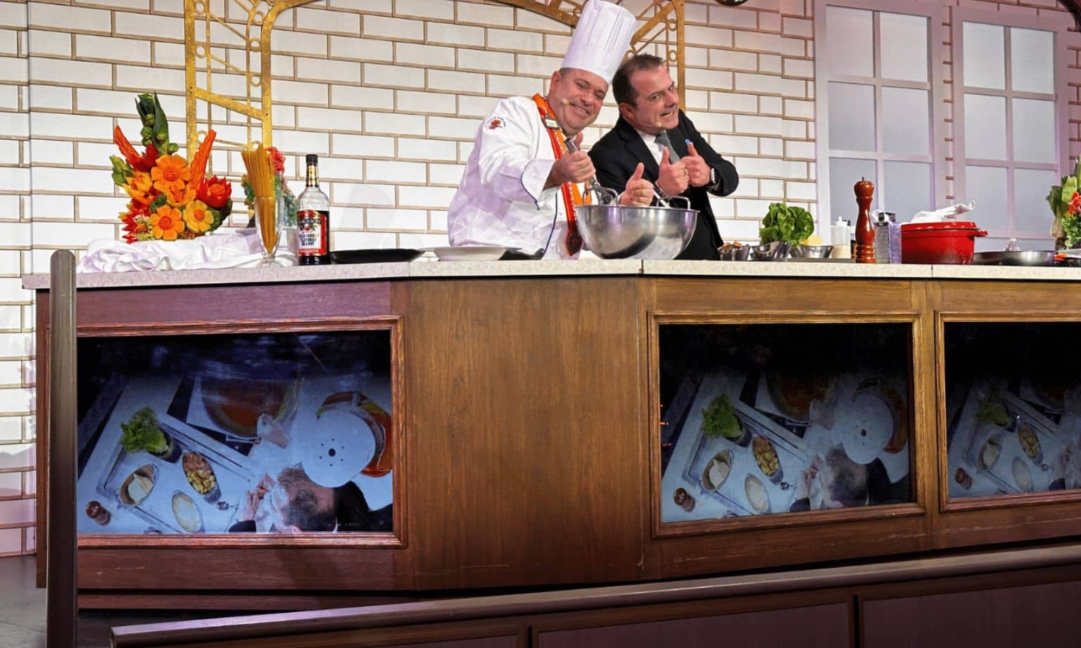 The chefs on Discovery Princess at a cooking demonstration