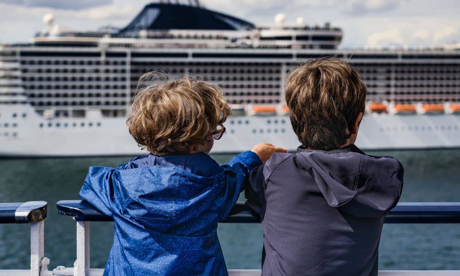 kids looking at ship