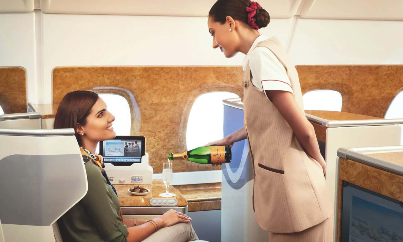 A woman in Emirates Business Class