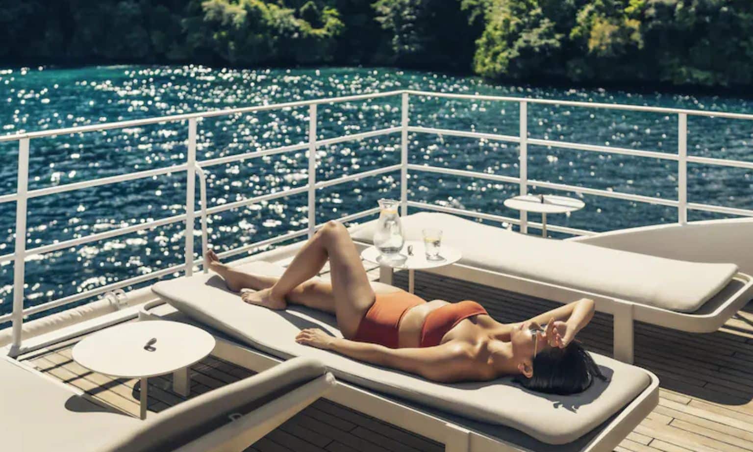 A woman relaxing on the Four Seasons Explorer
