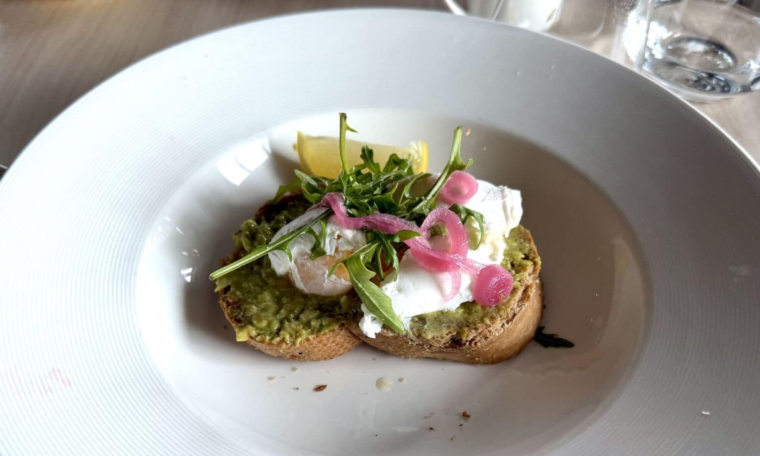 Avocado toast with poached eggs in the Main Dining Room