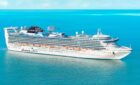 Carnival Adventure ship out to see taken from a bird's eye view from the air.