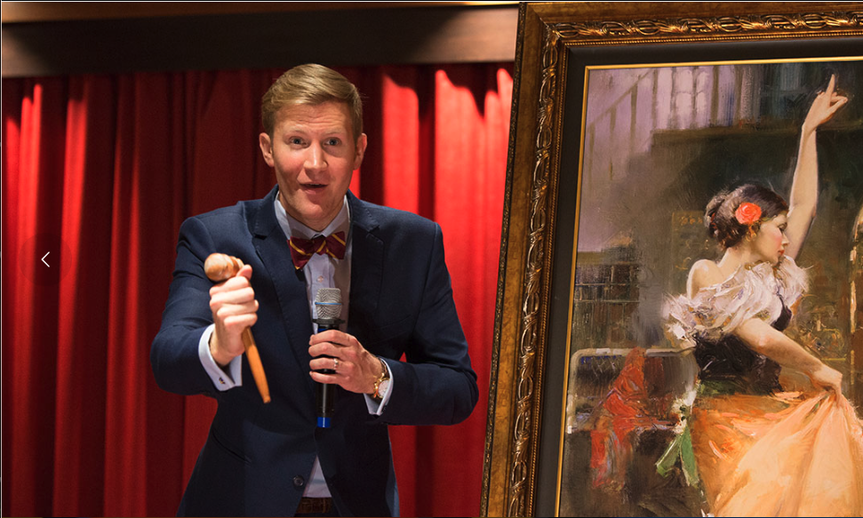 Ship board auctioneer in action