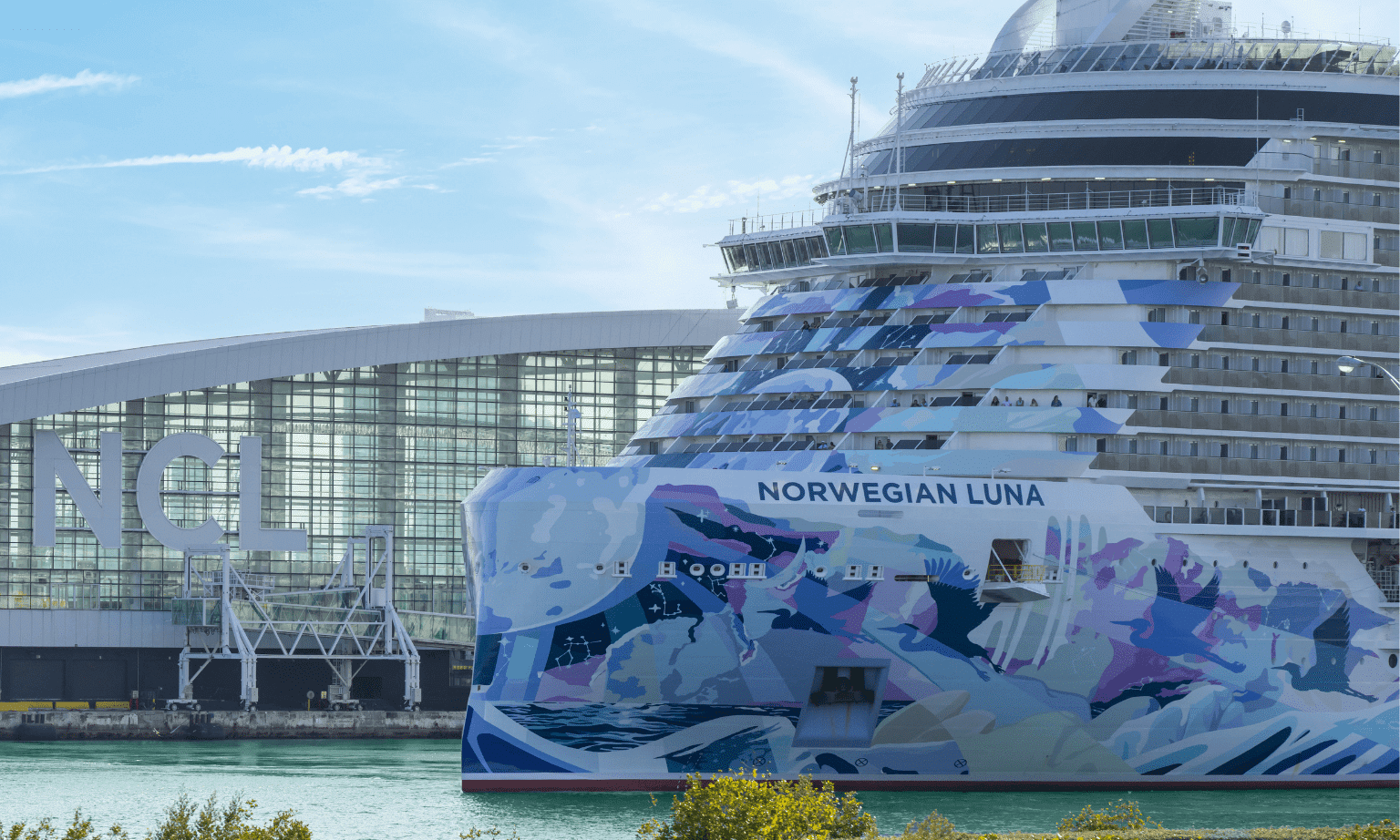The painted hull of a large cruise ship