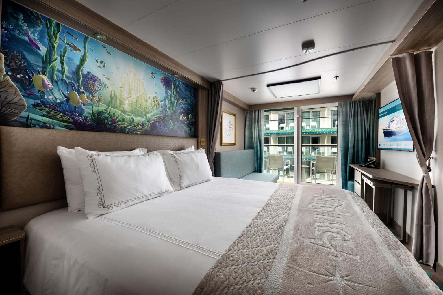 Premium garden view staterooms on the Disney Adventure feature a verandah overlooking Disney Imagination Garden, providing captivating views of onboard activities and entertainment throughout the day. (Kent Phillips, photographer)