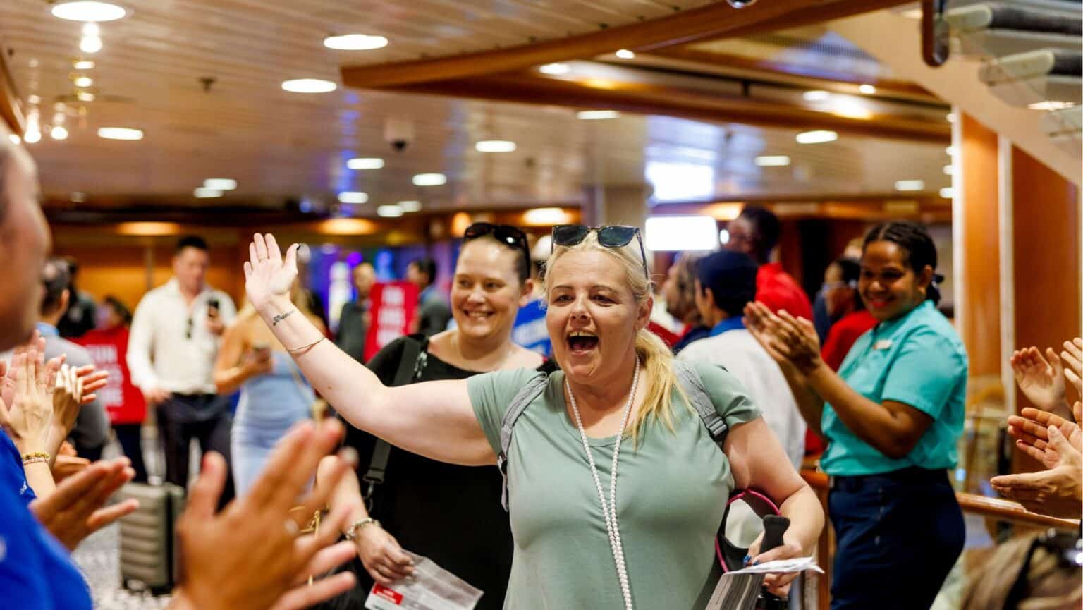 Passengers return to Carnival Encounter after the dry dock in Singapore