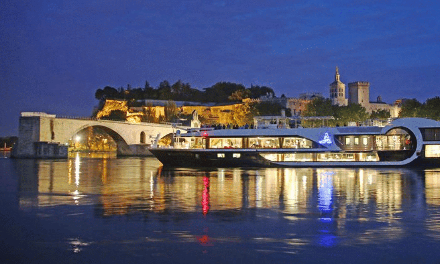A river cruise ship at night