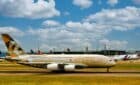 A Middle East airline Etihad plane sits on the tarmac